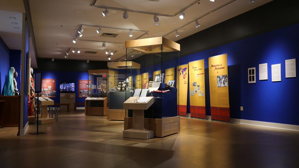 overview shot of the exhibit, showing cases, banners, and displays